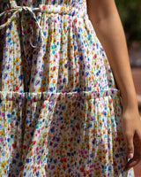 Close-up of a colorful floral dress with a blurred background