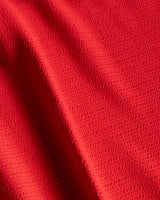Close-up of red fabric with folds