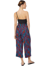 Navy blue organic cotton beach pants with elastic waistband with drawstring and tassel detail