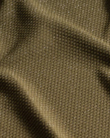 Close-up of brown fabric with visible texture