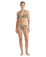 Woman wearing a zebra print bikini on a white background