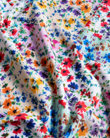 Multicolored floral fabric with a close-up view