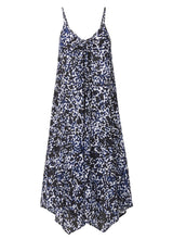 Black and white leopard print strappy and long flowy dress with adjustable back shoulder straps, and v-neckline front and back with pockets