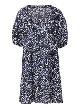a black and white leopard print slightly above the knee dress with rounded neckline and short puff sleeve with a covered elastic cuff