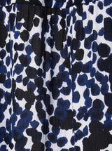 Close up and detailed shot of black and white leopard print 100% organic certified cotton