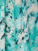 Close up and detailed shot of black white and blue leopard print 100% organic certified cotton