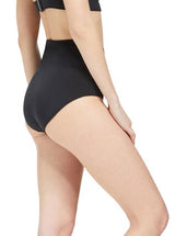 the side of Model wearing black classic high waist bikini bottom with full cheek coverage with matching bikini top