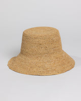 Beige woven bucket hat on a light gray background