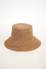 Brown woven bucket hat on a white background