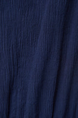 Close up shot of navy blue 100% certified organic cotton