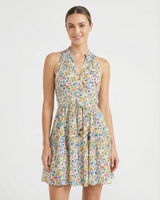 Woman wearing a floral dress on a white background