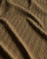 Close-up of brown fabric with visible texture