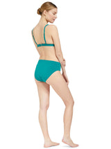 The back of a model wearing a green plunge neckline, classic bikini topwith adjustable straps and an elastic underband with a matching classic midrise bikini bottom
