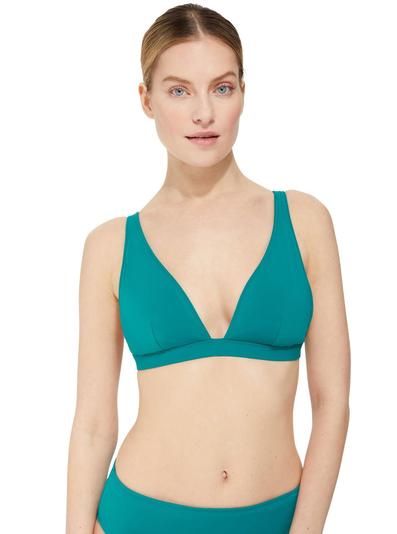 Model wearing a green plunge neckline, classic bikini topwith adjustable straps and an elastic underband with a matching classic midrise bikini bottom