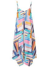 Geometric and graphic colored strappy and long flowy dress with adjustable back shoulder straps, v-neckline front and pockets 
