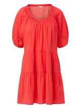 coral red slightly above the knee dress with rounded neckline and short puff sleeve with a covered elastic cuff 