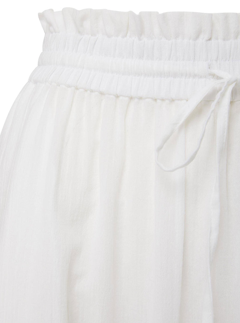 Close up and detailed shot of fresh white midi length skirt with elastic waistband with drawstring detail 