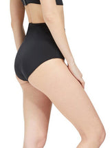 the side of Model wearing coral classic high waist bikini bottom with full cheek coverage with matching bikini top 