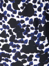 Close up and detailed shot of Black and white leopard print 78% Recycled Repreve® Nylon 22% Spandex fabric