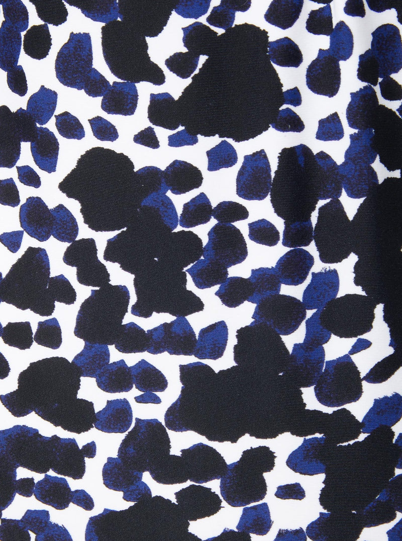 Close up and detailed shot of black and white leopard print colored 78% Recycled Repreve® Nylon 22% Spandex fabric