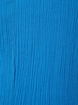Close up shot of grotto blue (light blue) 100% certified organic cotton 