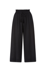Black organic cotton beach pants with elastic waistband with drawstring and tassel detail