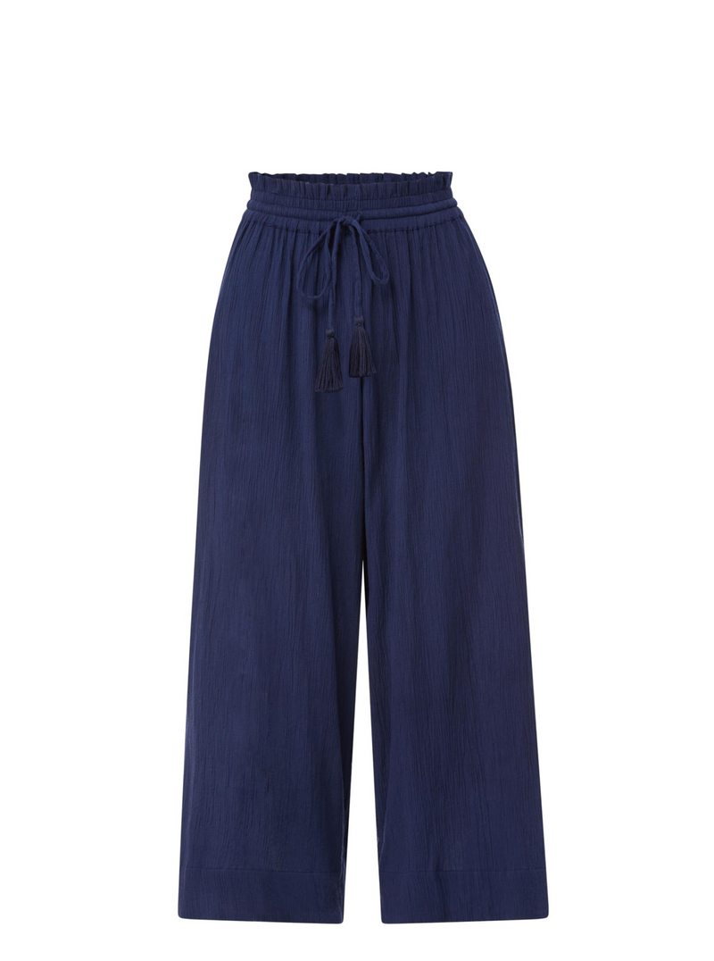 Navy blue organic cotton beach pants with elastic waistband with drawstring and tassel detail