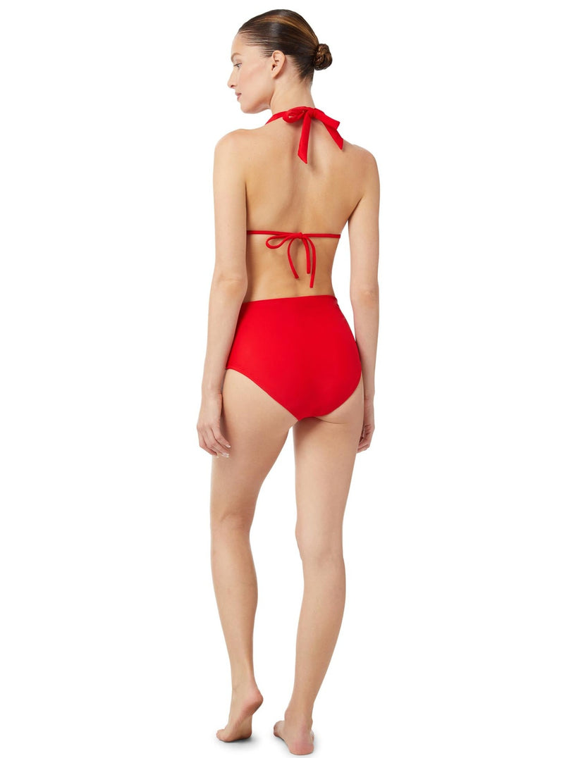 Back of a model wearing a cherry red bikini top with halter neck tie, adjustable cups, and a spaghetti tie under the bust with matching high waist bikini bottoms 